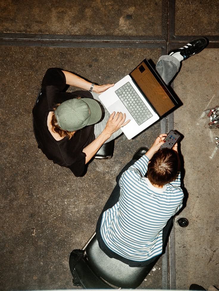 Overhead editorial office scene